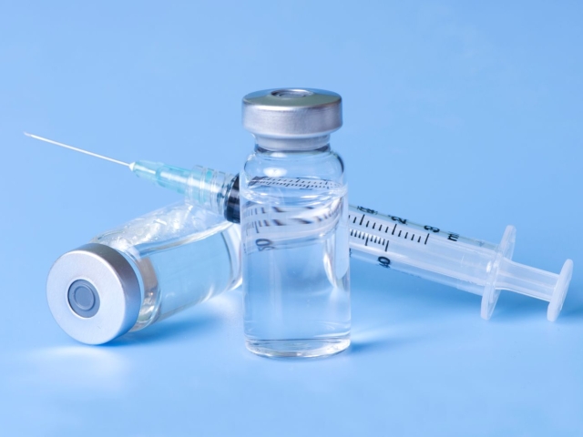 injection syringe and bottle