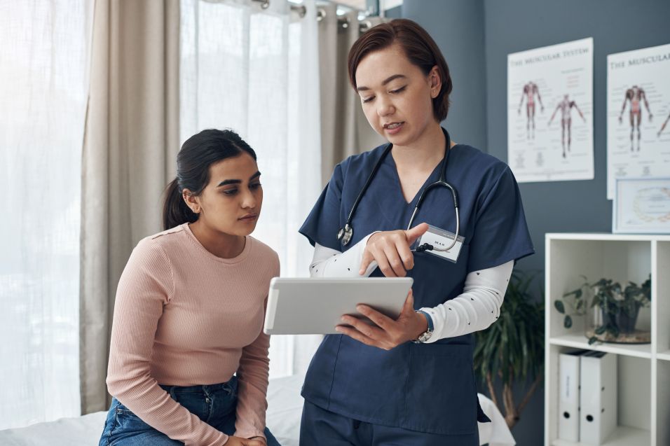 woman speaking with doctor about options