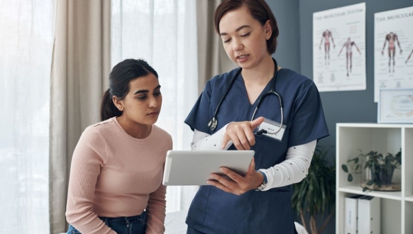 woman speaking with doctor about options
